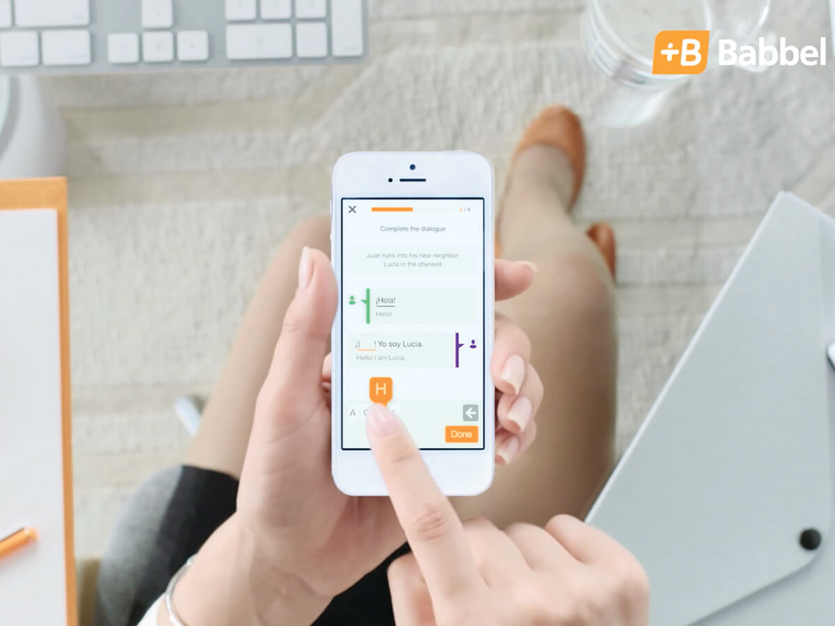 Babbel phone mockup with hands