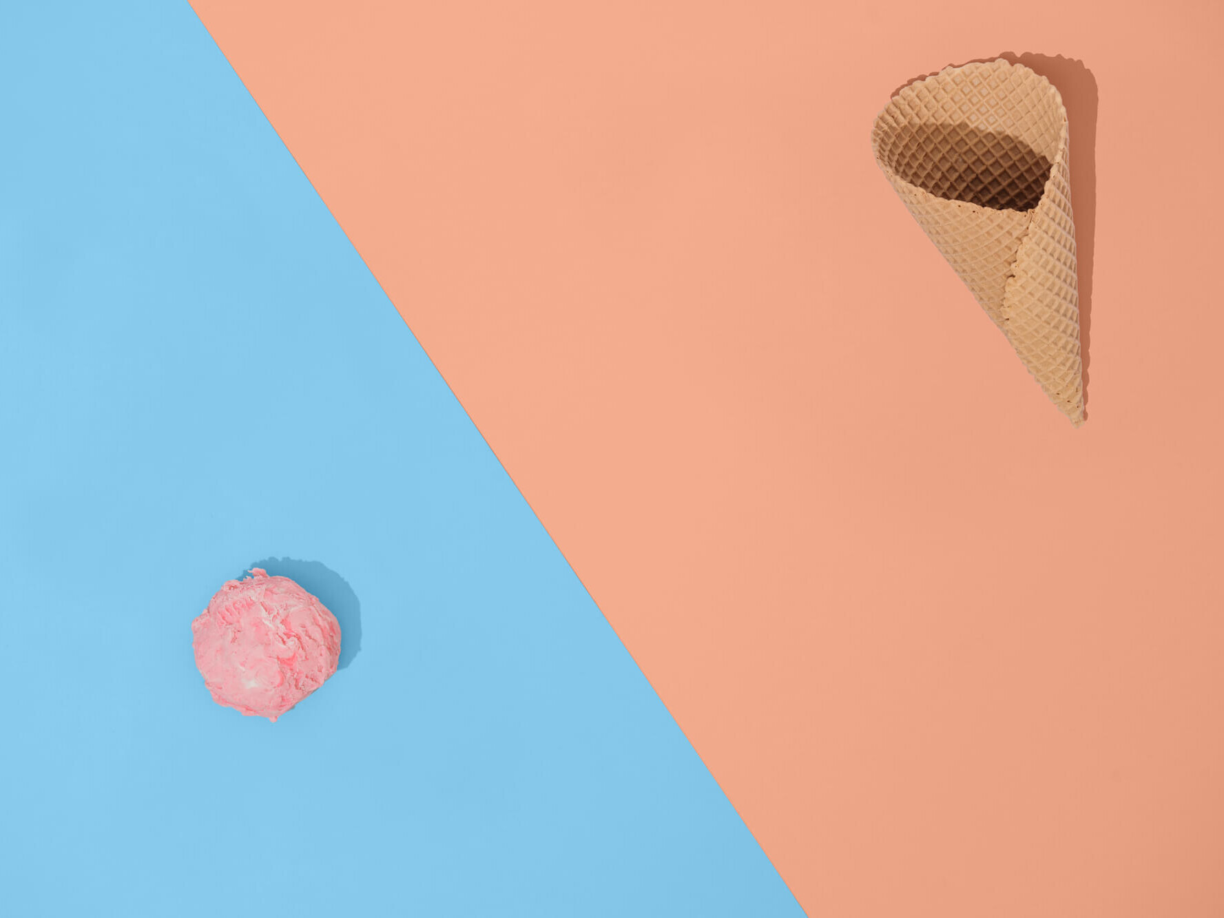 ice cream cone with ice cream on the side